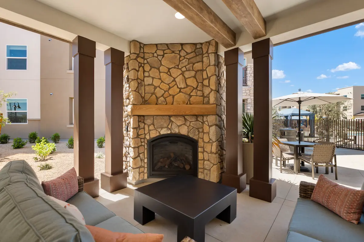 Outdoor Lounge with Fireplace - Terra Vista Community Amenities