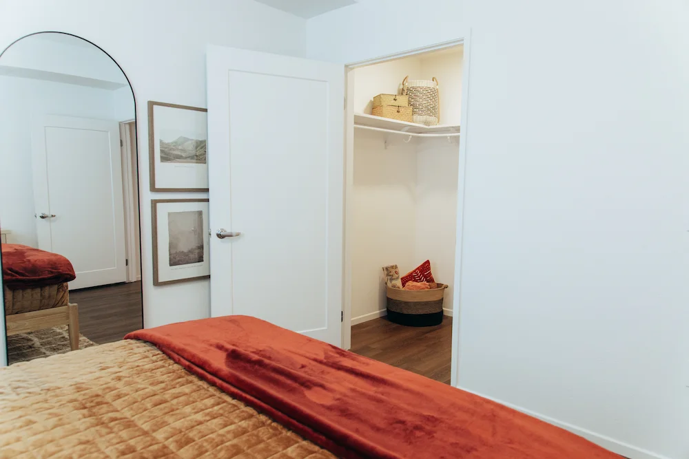Primary bedroom with walk-in closet - Terra Vista Apartments