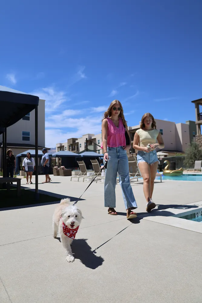 Women Walking Dog at Terra Vista Apartments at Tejon