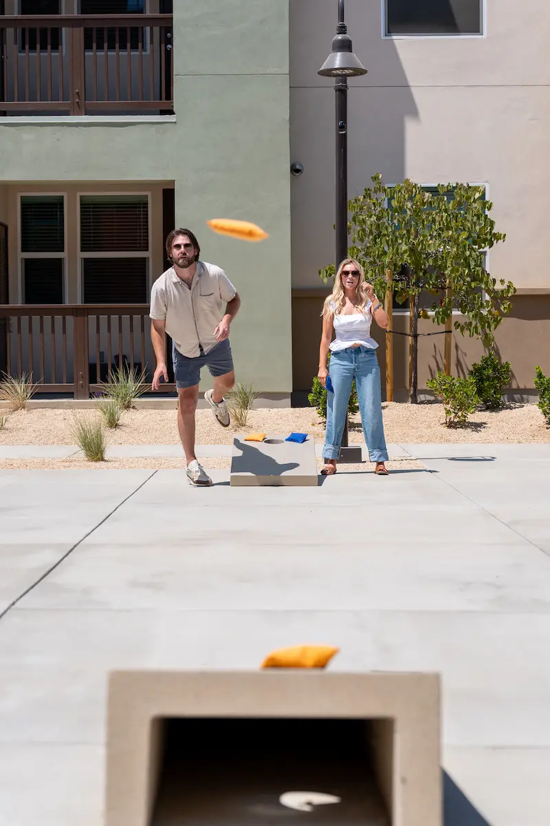 Tenants Playing Corn Hole at Terra Vista