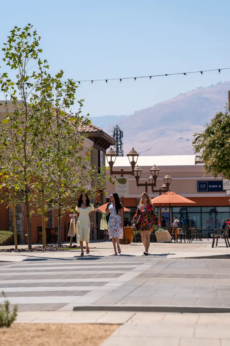 Woman Crossing the Street by Terra Vista Apartments